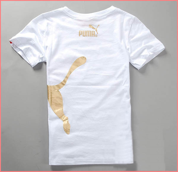 white and gold puma shirt